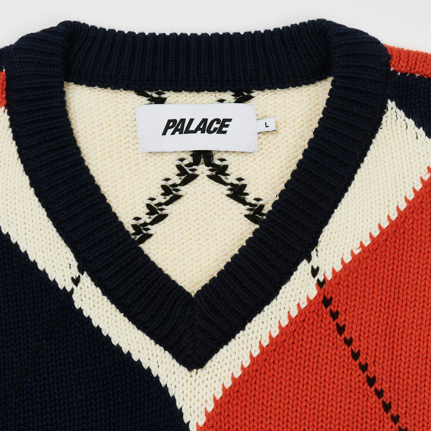 Argyle Knit Vest Navy / Orange - Winter 2023 - Palace Community